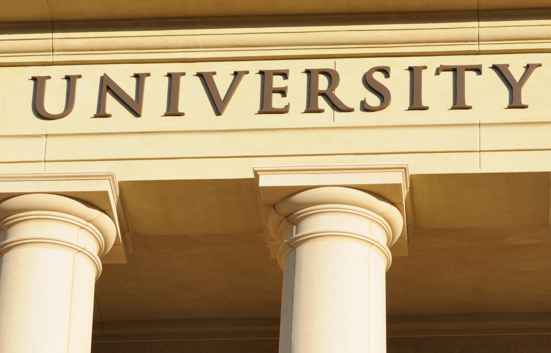 University sign on building